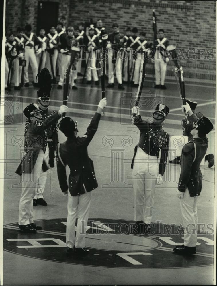 1984 Press Photo Rigles are raised in salute at St. John&#39;s Military Academy - Historic Images