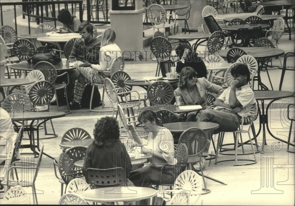 1987 Press Photo People sitting, Memorial Union terrace, University of Wisconsin - Historic Images