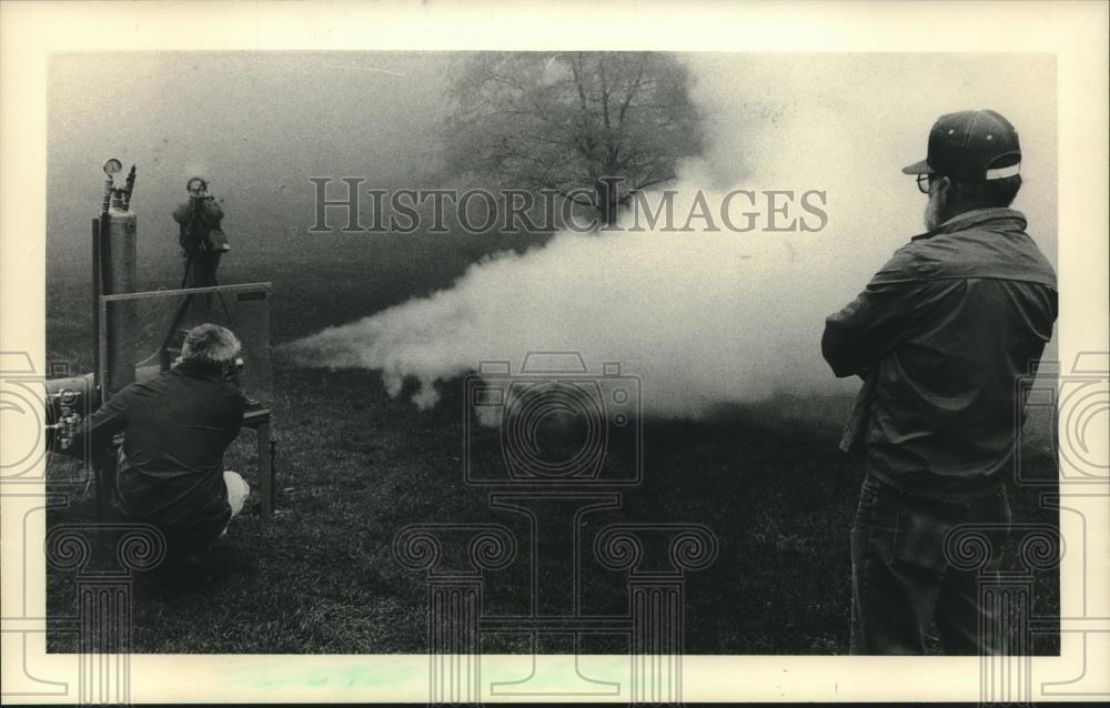 1984 Press Photo Exhaust Fumes Firing From Rocket at University of Wisconsin - Historic Images