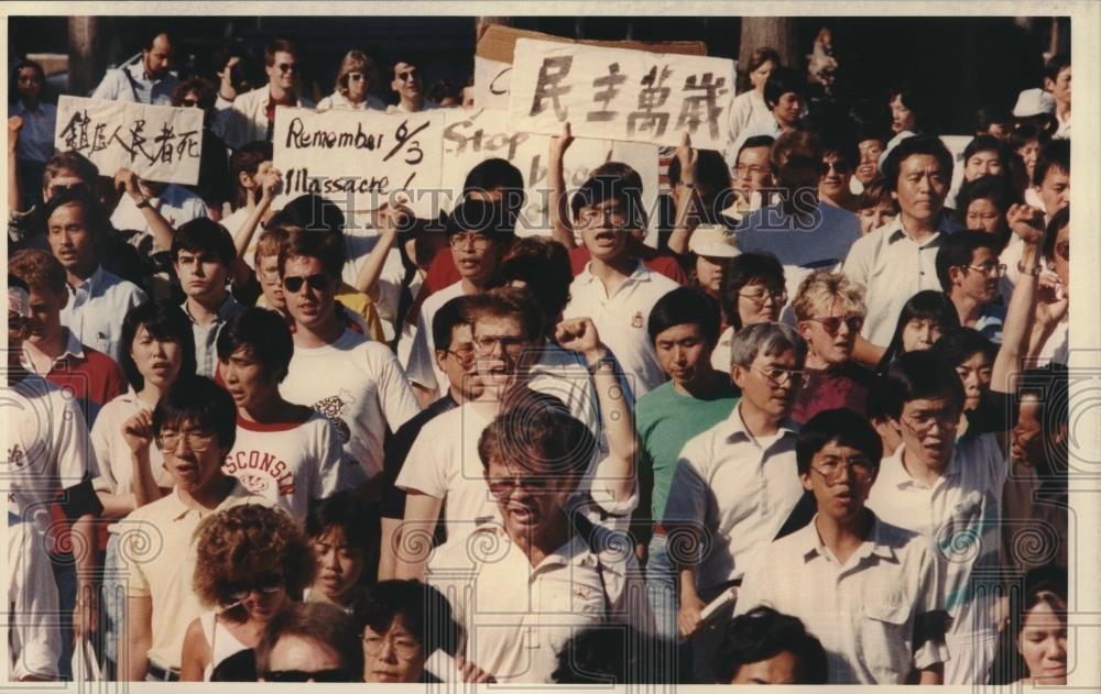 1989 Press Photo Students hold sign at protest, Madison Wisconsin - mjc25862 - Historic Images