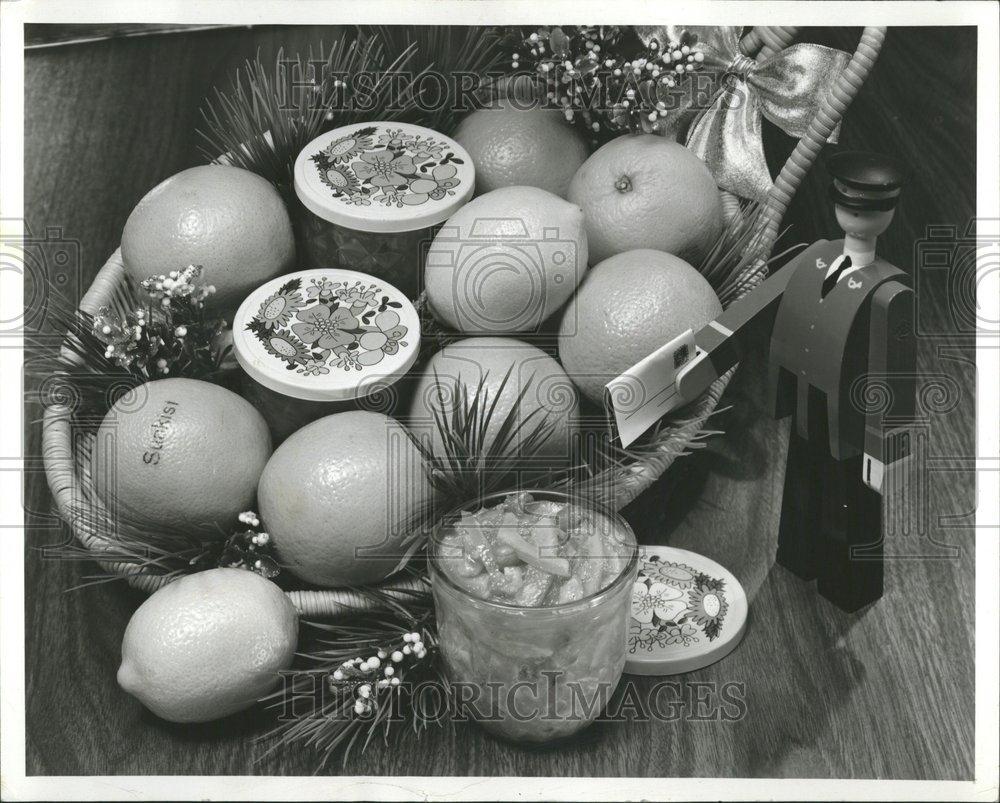 Lemons arranged with some jams. - RRV41143 - Historic Images