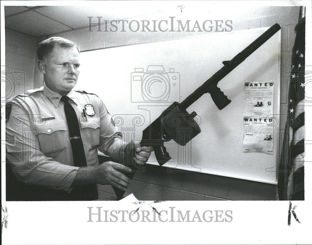 1989 Press Photo Story Guns Clinton Township Dept - RRV72999 - Historic Images