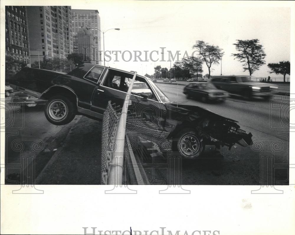 1986 Press Photo Taxi Hit Kevin Down Through Fence - RRV01109 - Historic Images