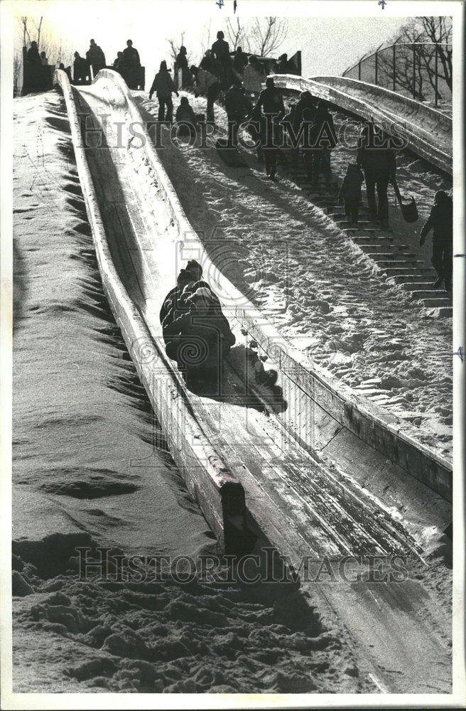 1978 Press Photo Scene Snow Fun Slide - RRV68801 - Historic Images