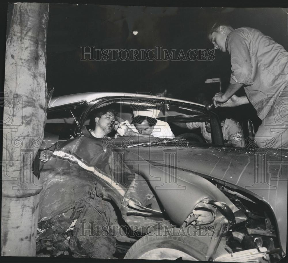 1960 Press Photo Unknown Nurse and Fireman help youths - RRV01231 - Historic Images