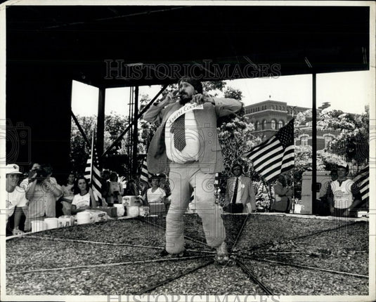 1982 Press Photo unidentified demonstrator stomped on a gigantic apple pie - Historic Images