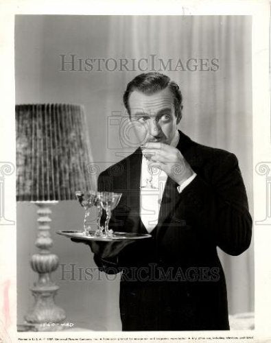 1957 Press Photo David Niven suave butler zany society - Historic Images