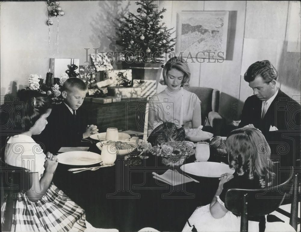 Press Photo Family Having Christmas Dinner - Historic Images