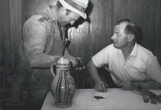 1968 Press Photo Residents of Germany get their beer for a Notch instead of mone - Historic Images