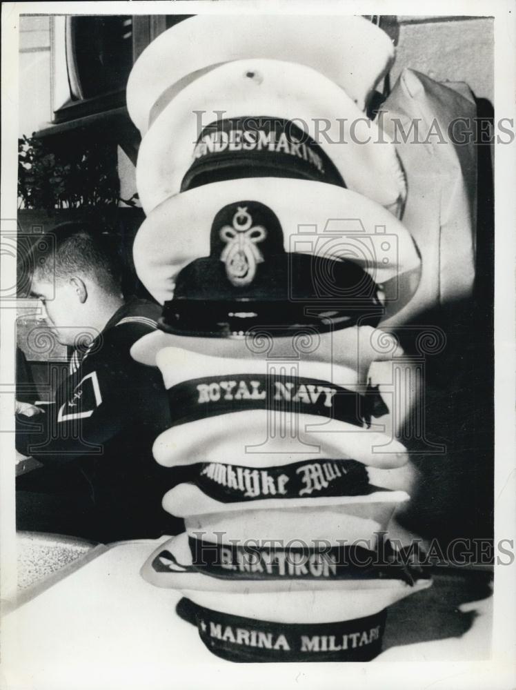 1964 Press Photo Hats from the seven nations aboard the U.S. Destroyer Claude V. - Historic Images