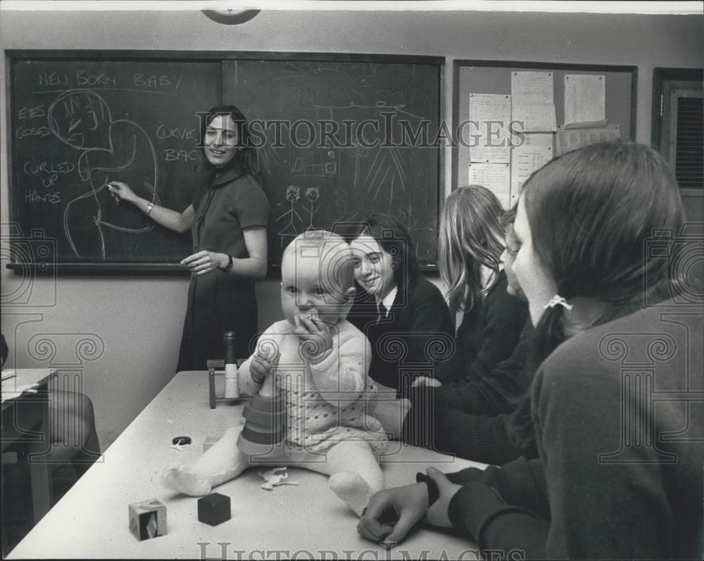 Press Photo Jenny Baby During Child Care Class - Historic Images