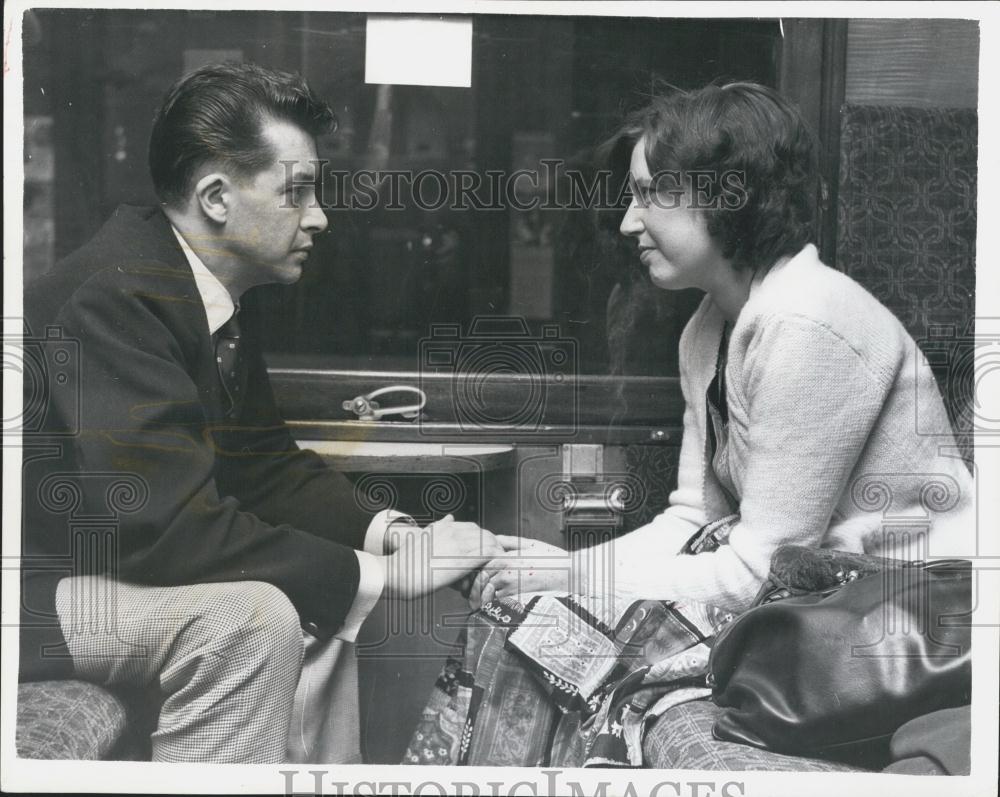 1961 Press Photo Tom Swinhoe and his wife Joan sit on the train to West Denton - Historic Images