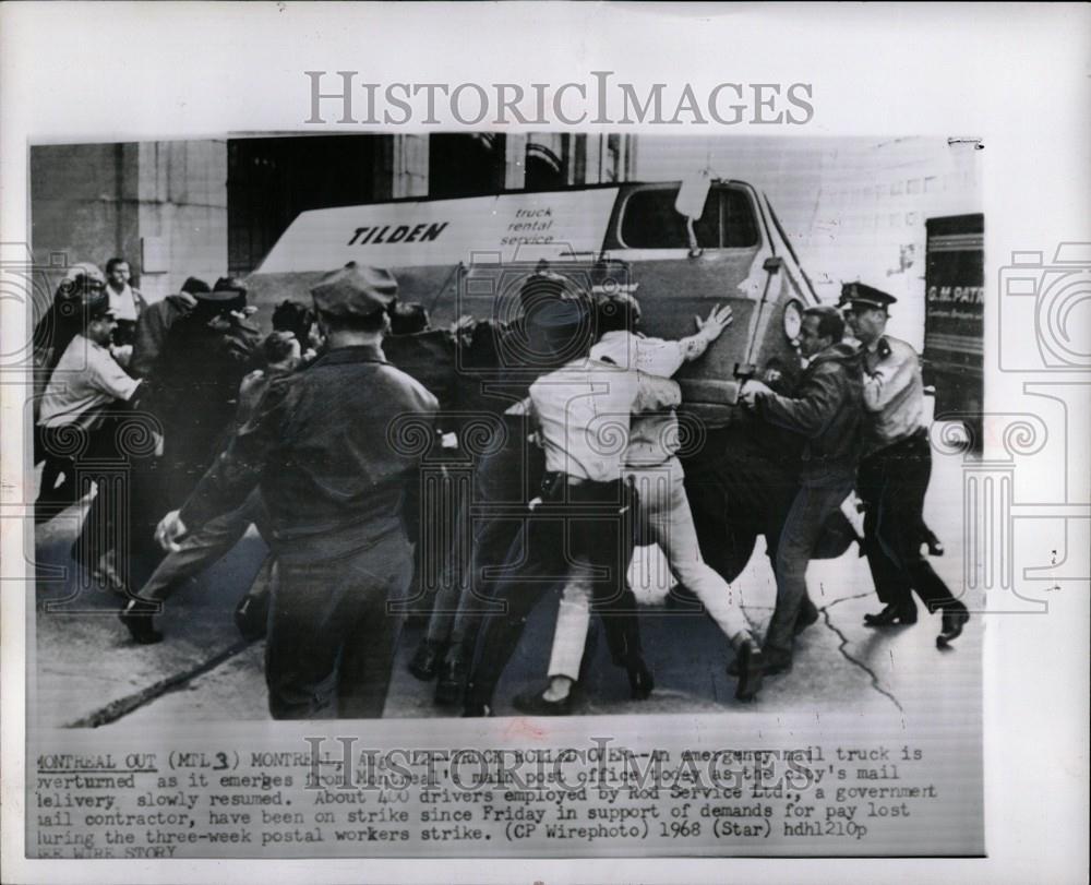 1968 Press Photo Montreal mail truck overturned - Historic Images