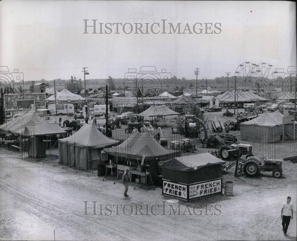 1963 Press Photo flowers blooming spring tents barkers - Historic Images