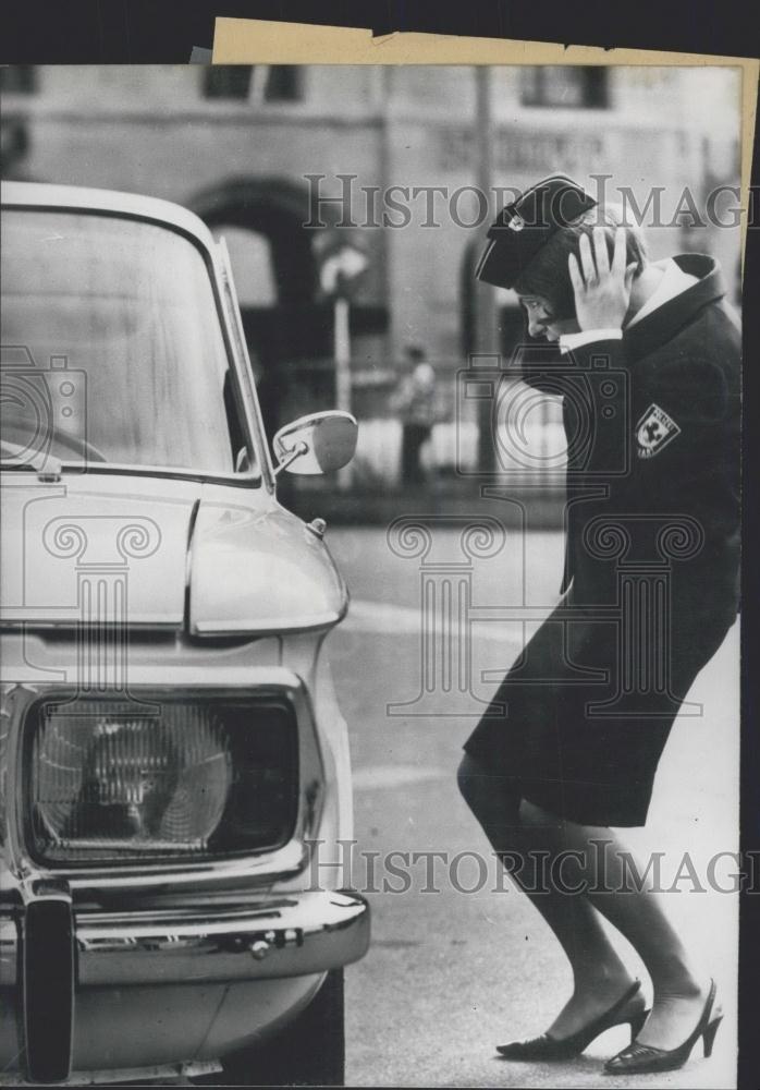 1968 Press Photo Uniformed women checks hat - KSC20545 - Historic Images