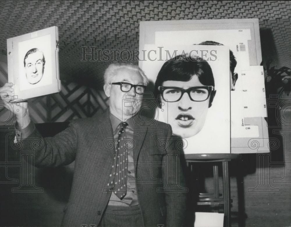 1970 Press Photo Mr. Jacques Penry, the inventor, holds up a finished portrait - Historic Images