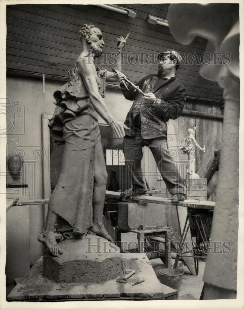 1957 Press Photo Mr. David McFall at work on his statue of St. Bride&quot;&quot; - Historic Images