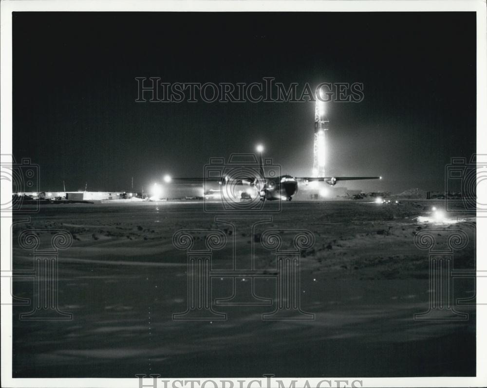 Press Photo Hercules aircraft unloading on runway in North Slope, Alaska - Historic Images