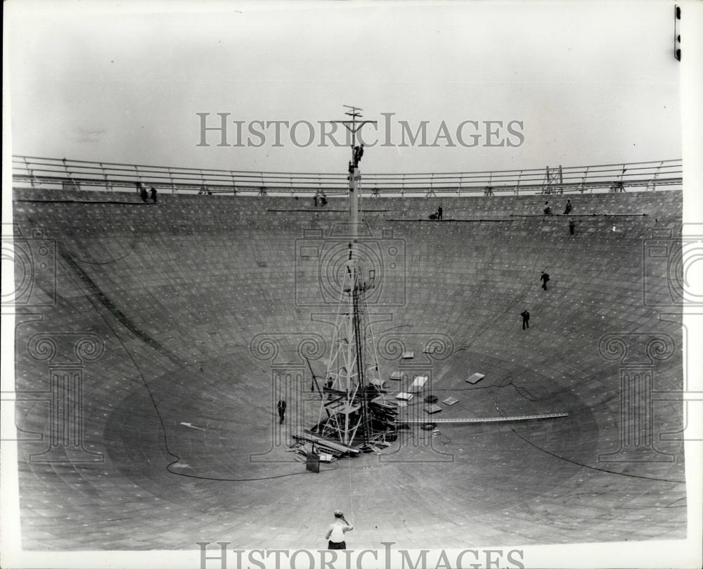 1957 Press Photo Looking down into the vast reflector which is almost complete - Historic Images