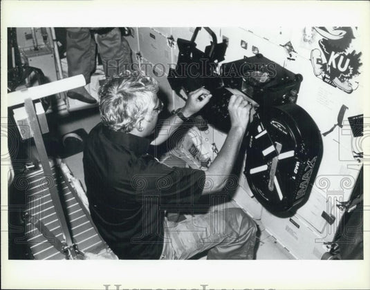 Press Photo A Man Operates IMAX Machinery - Historic Images