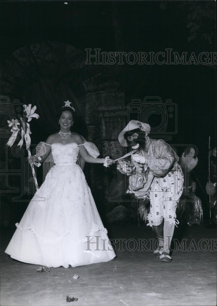 Press Photo Woman In Evening Gown Leading Man Dressed Monkey On leash - Historic Images