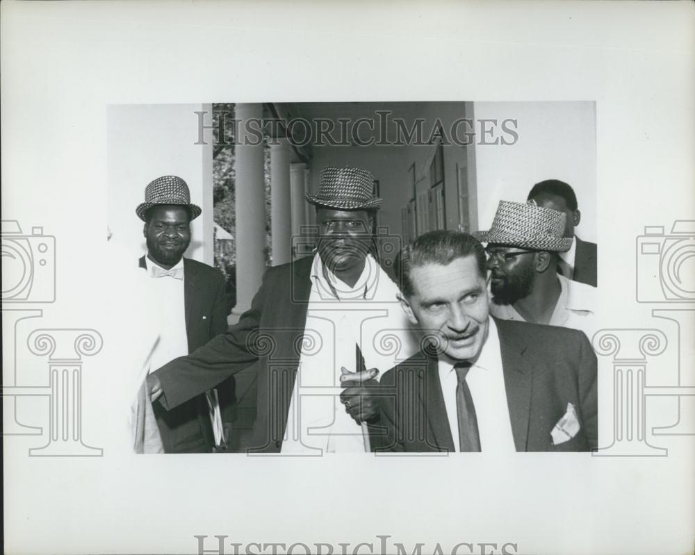 1965 Press Photo Mr. Nxomo Leaving Conference Room - Historic Images