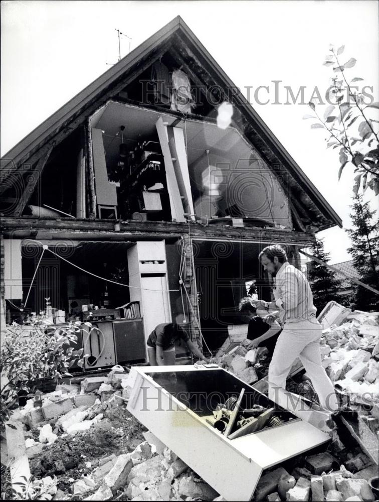 Press Photo Man Has Ditch Dug Around Home-Home Collapses-Malmo, Sweden - Historic Images