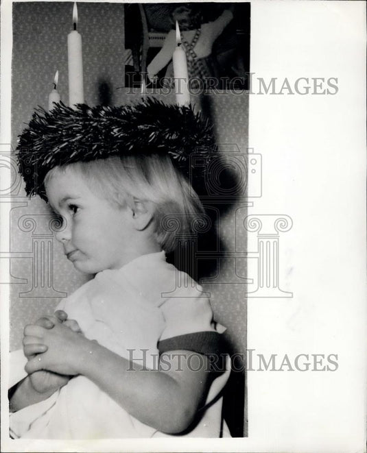 Press Photo Two Year Old Lucia Bride & birthday candle hat - Historic Images