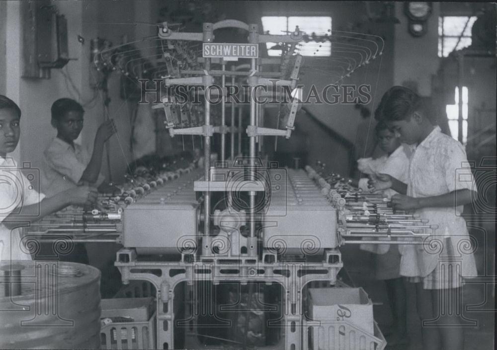 Press Photo Indian boys in a silk factory in Bangalore, India - Historic Images
