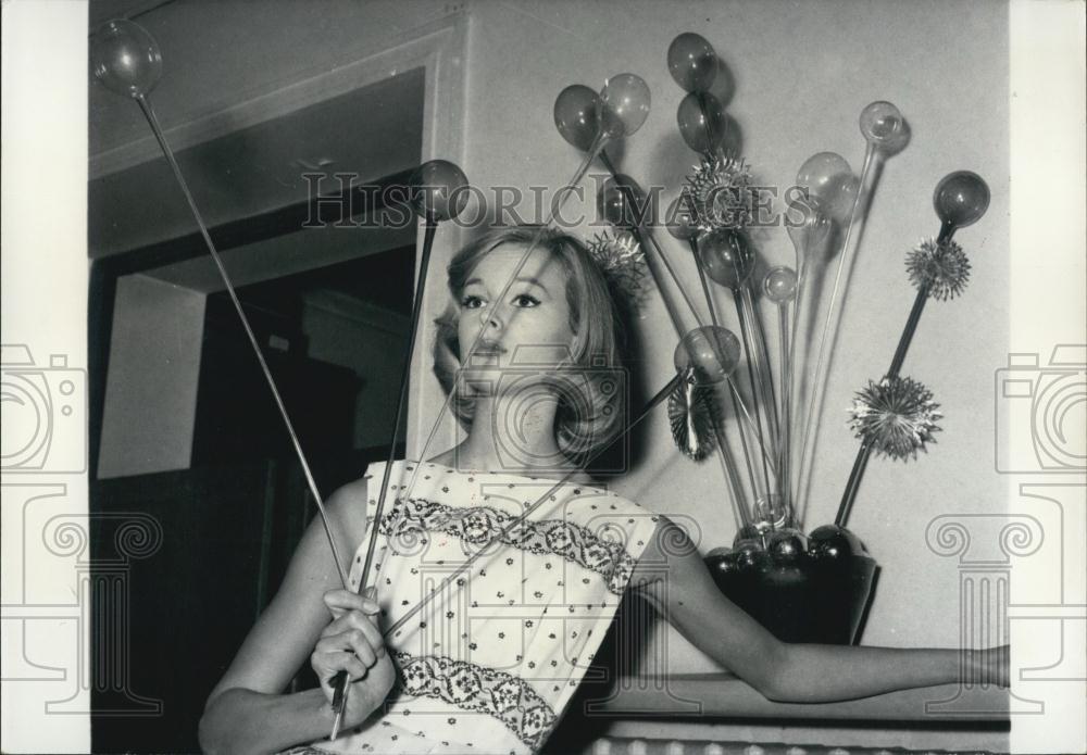 1957 Press Photo Glass balls on stems for Christmas decorations. - Historic Images