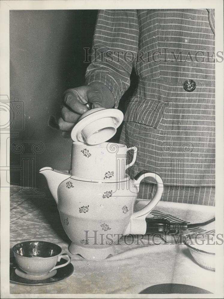 Press Photo Porcelain Coffee Pot And Filter - Historic Images