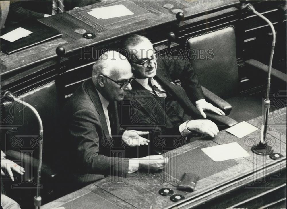 Press Photo Mr. Averof, Minister of National Defense, talking with Mr. Rallis, - Historic Images