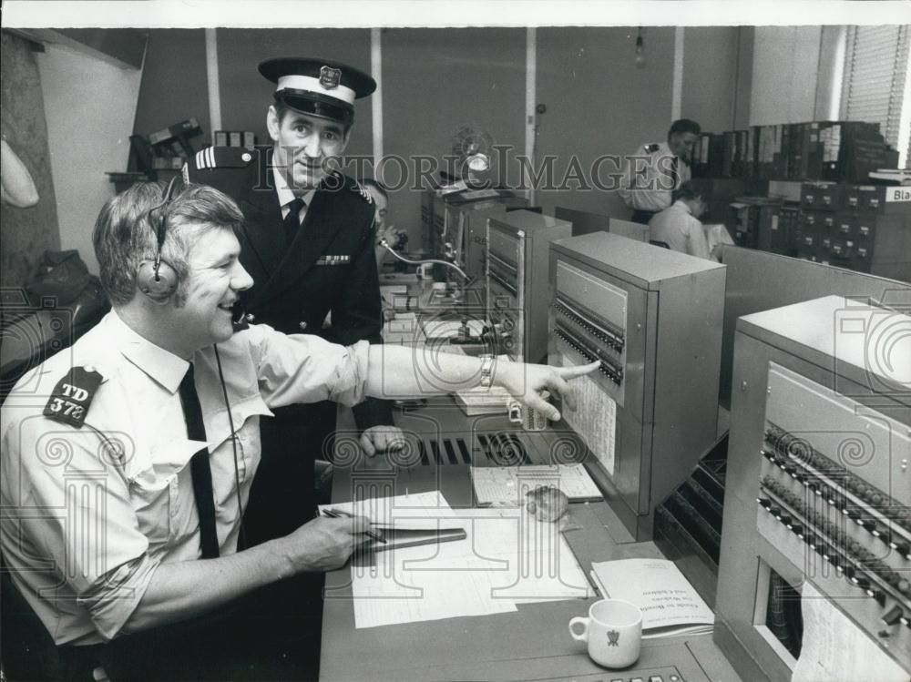 Press Photo Tom Cook (right) in the control room at New Scotland Yard today - Historic Images