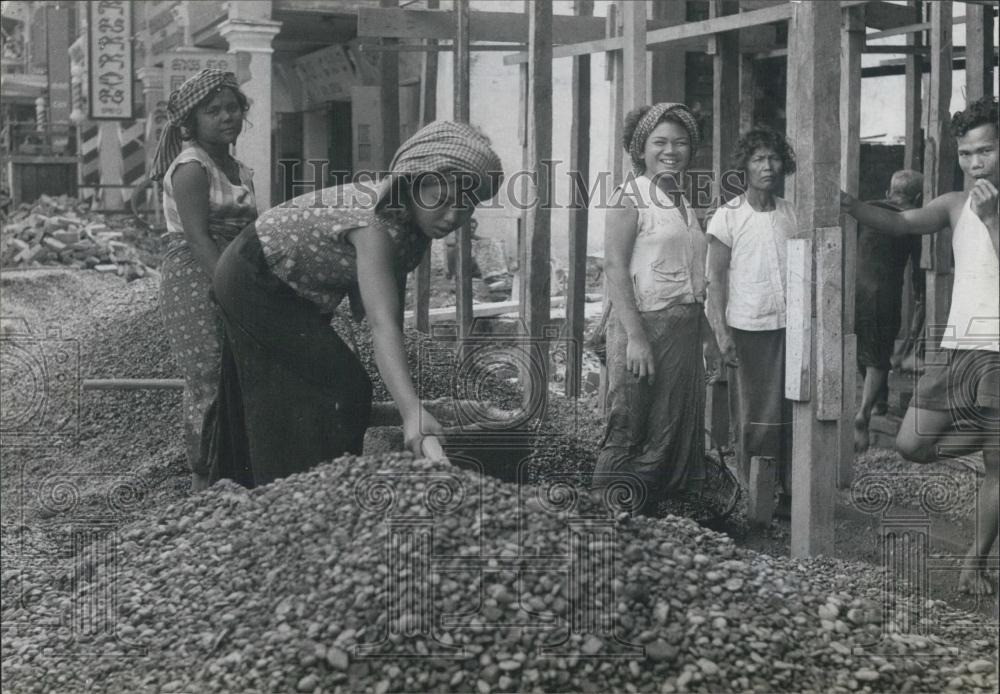 Press Photo Girl-Laborers in Phnom, Benh, Cambodia Mixing Cement - Historic Images