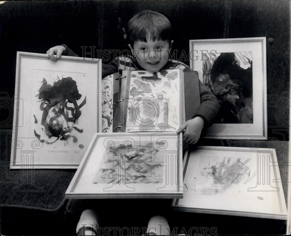 Press Photo &quot;Gino&quot; with some of his paintings - Historic Images