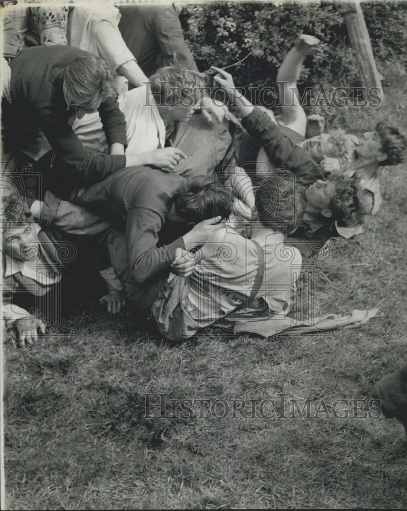 Press Photo Young men playing - Historic Images