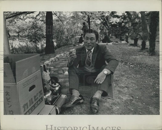 Press Photo Japanese businessman at Cherry blossom time - Historic Images