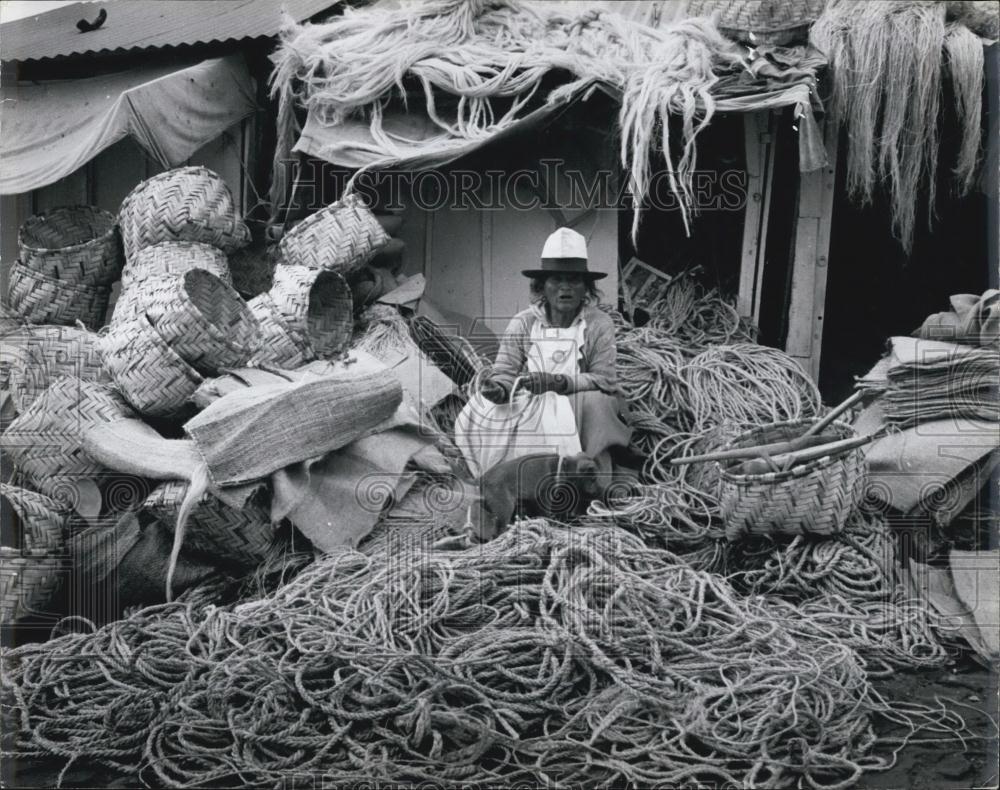 Press Photo Woman Selling Rope, baskets, Ecuador - Historic Images