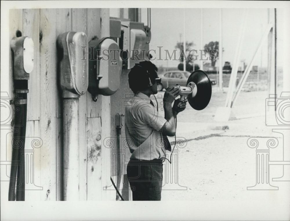 Press Photo Research Worker & Directional Microphone For Electrical Discharges - Historic Images