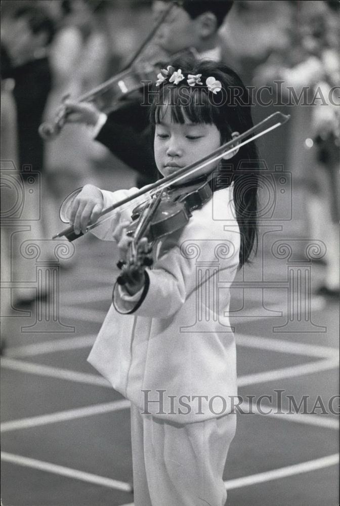 Press Photo Young Japanese Violinist Performing Tokyo Massed Concert - Historic Images