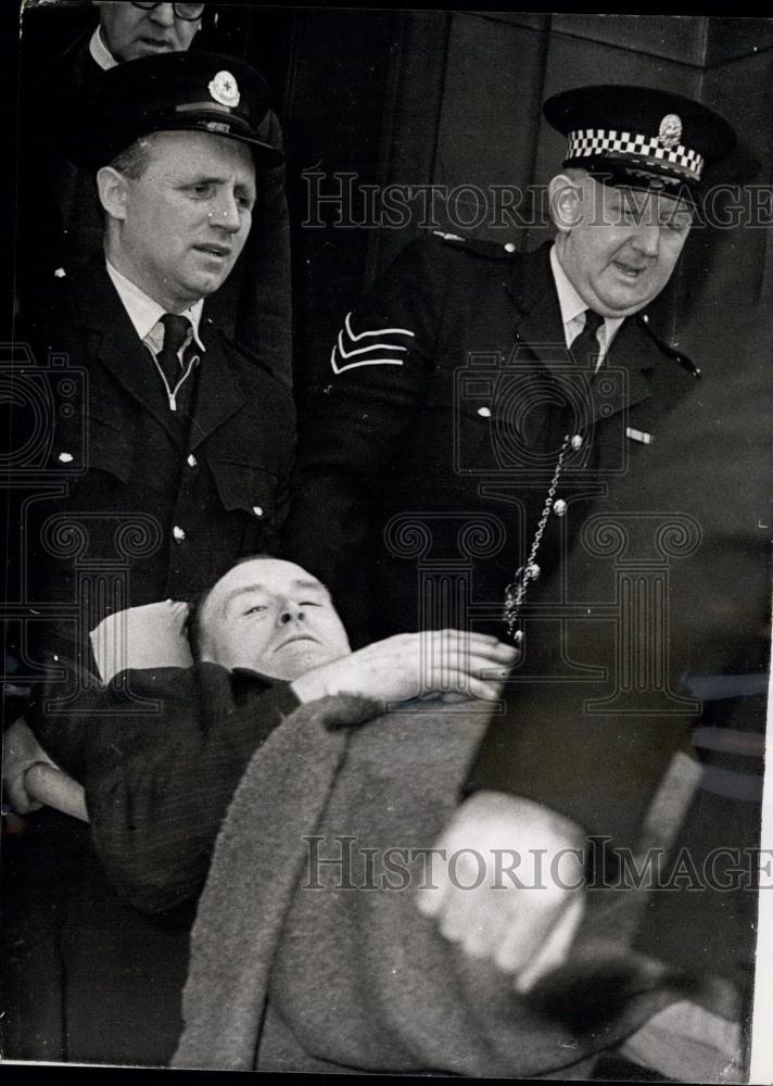 Press Photo Wm Watt Leaves His Wife's Murder Trial After He Fell In Stretcher - Historic Images