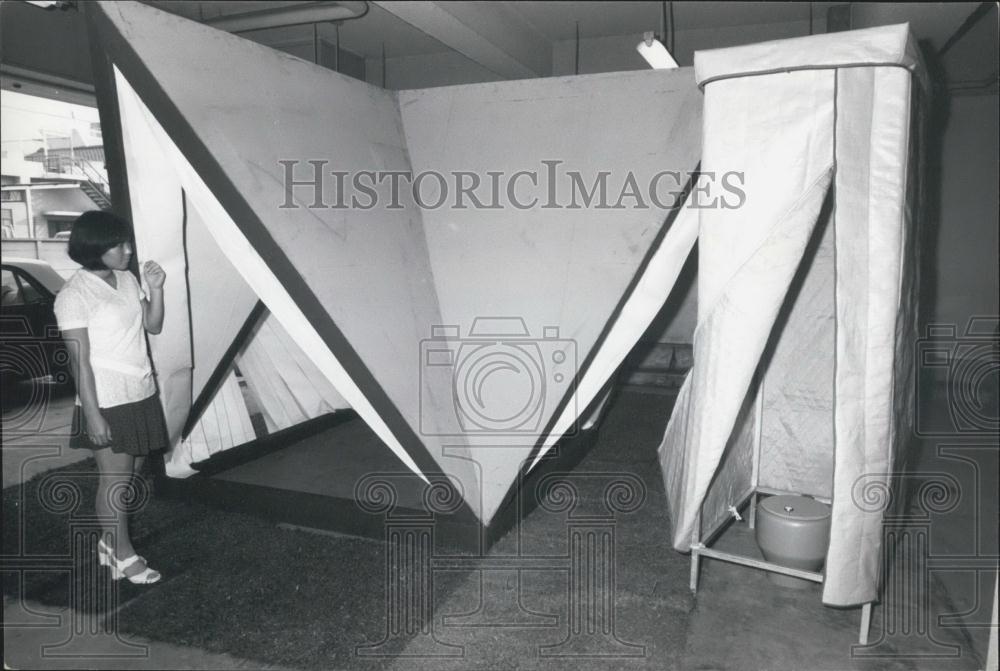 Press Photo Paper houses going cheap - Historic Images