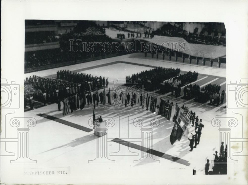 1956 Press Photo General view. The Italian Miss Chenal-Minuzzo speeks the Olympi - Historic Images