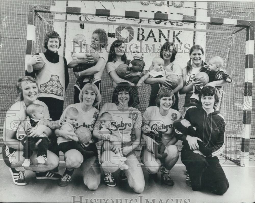 Press Photo Danish Women&#39;s Handball Team Members Holding Babies - Historic Images