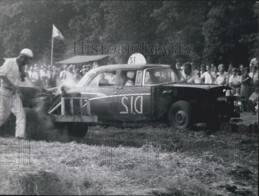 Press Photo Engine Smoking While Stuck At Sensational Auto Cross - Historic Images