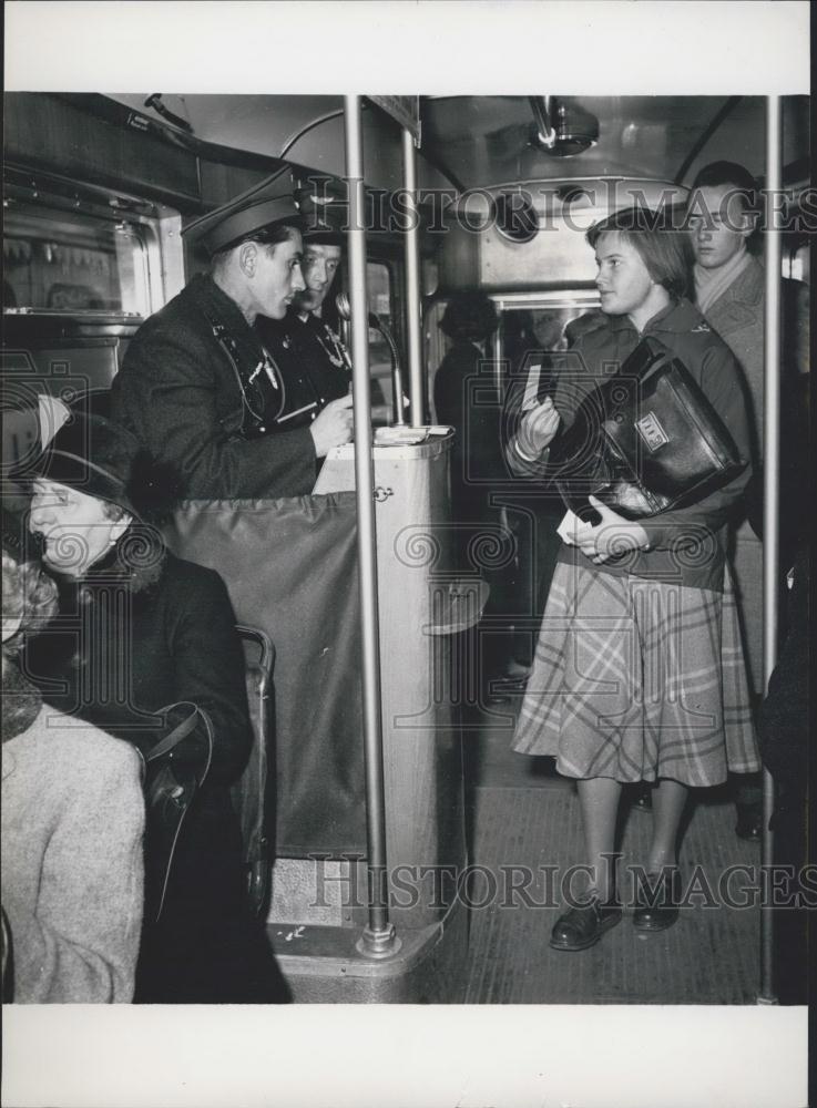 Press Photo Passenger with Season Ticket is Taking Her Seat - Historic Images