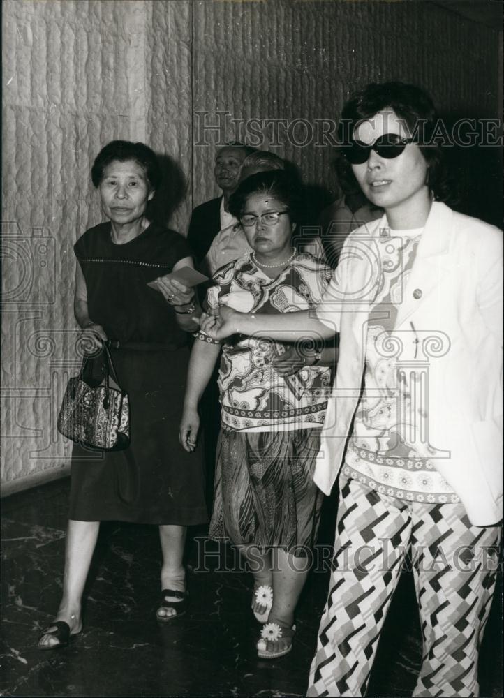 Press Photo Woman Walking Together - Historic Images