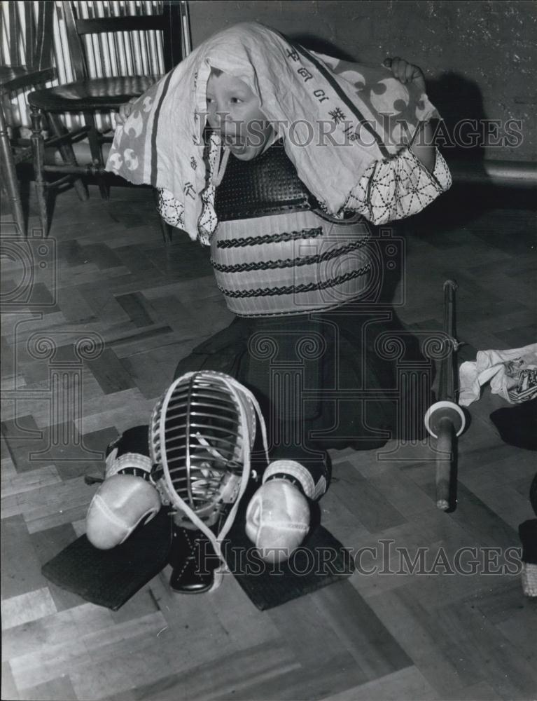 Press Photo Boy Playing With Japanese Scarf, Costume - Historic Images