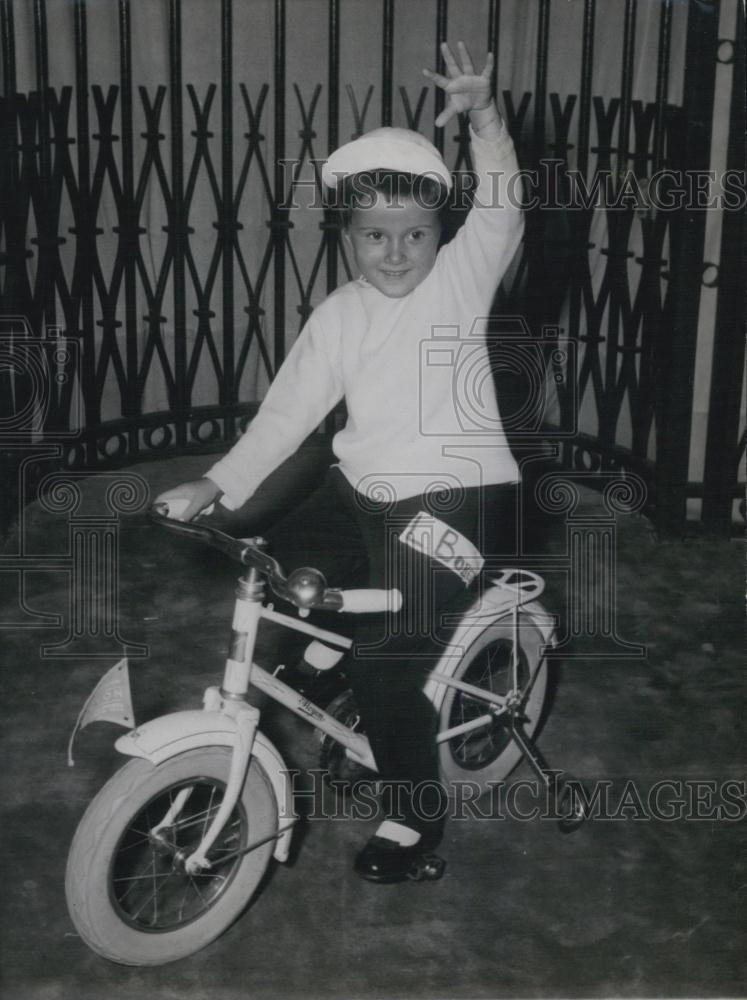 Press Photo Boy Wearing Tour De France Inspired Fashion On Bicycle - Historic Images