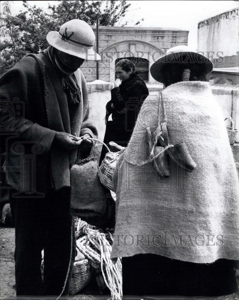 Press Photo Ecuador natives in panchos - Historic Images